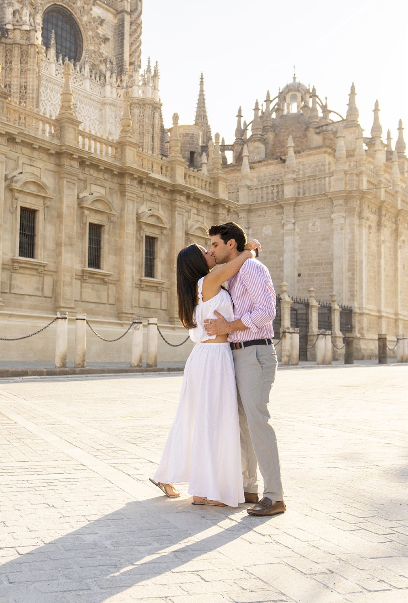 Relaxed engaged couple in the streets of Seville