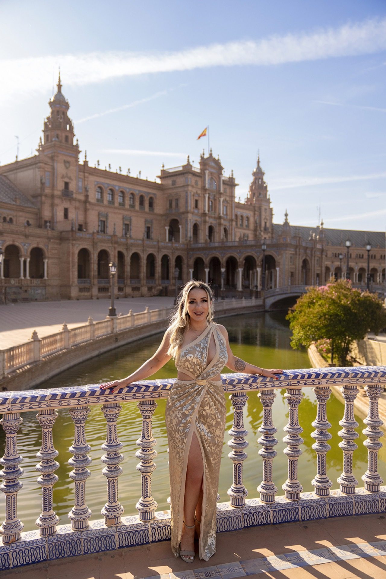 Elegant portrait on the tiled bridge at Plaza de España, Seville