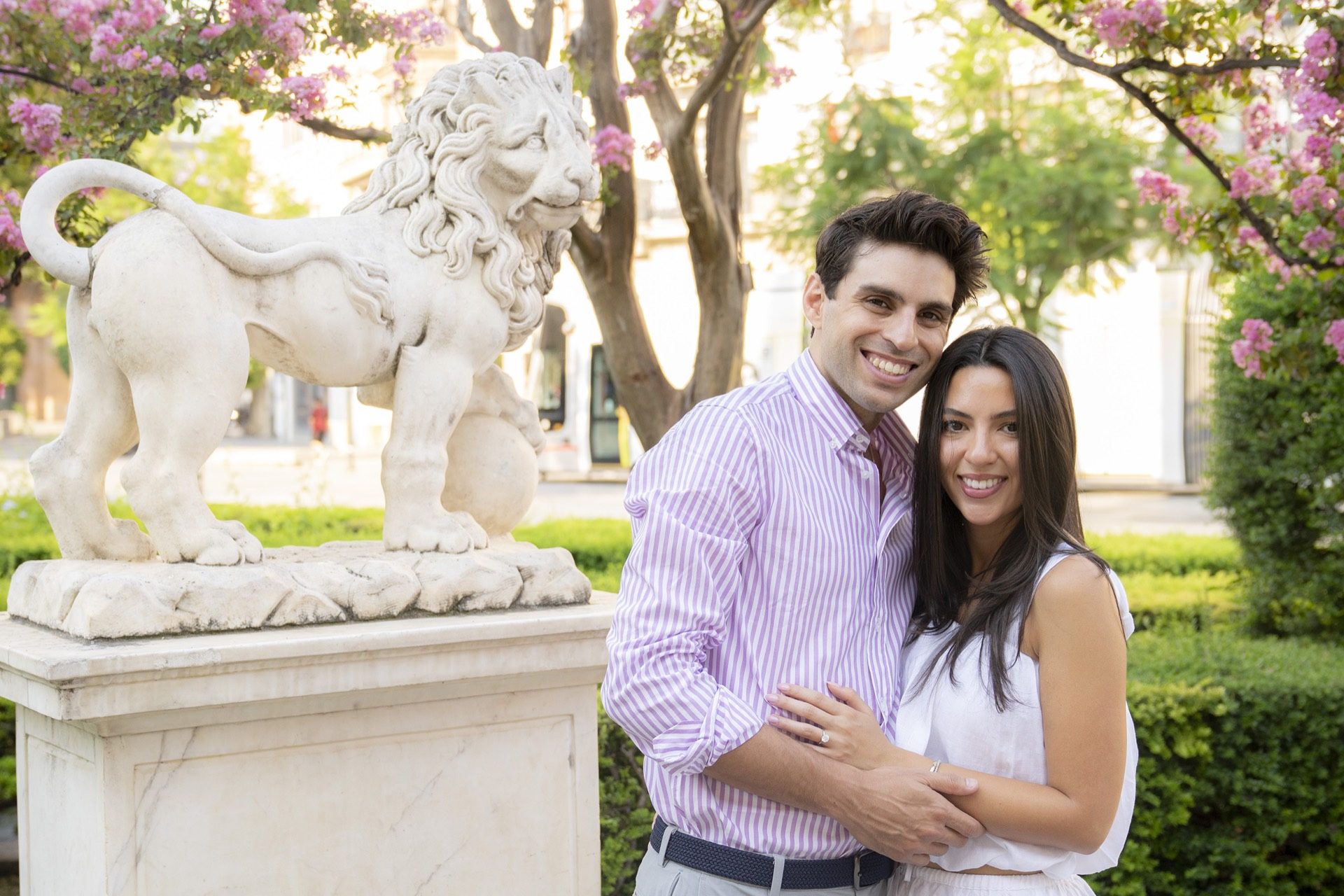 Newly engaged couple by Seville Cathedral